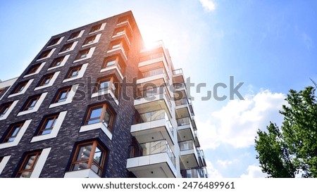 Similar – Image, Stock Photo modern building and a lantern with a grey cloudy sky