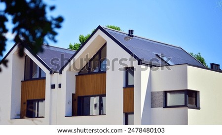 Similar – Foto Bild Fassade eines Wohnhaus in Beige und Naturfarben im Licht der Abendsonne am Abend im Stadtteil Bornheim in Frankfurt am Main in Hessen