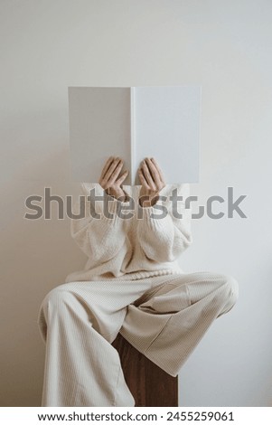 Similar – Image, Stock Photo Woman covering face with bunch of bananas. Neon