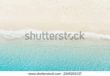 Similar – Foto Bild Blaue Meereswellen und wunderschönes Sandstrand in Portugal