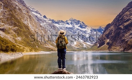 Similar – Image, Stock Photo Famous lake side view of Hallstatt village with Alps behind, Foliage leaves framed. Austria