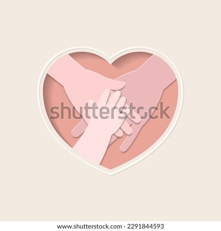 Three hands of family members, baby, mother and father, on top of each other in heart shaped paper cutting art