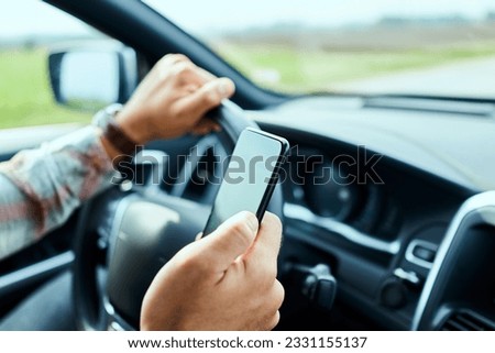 Image, Stock Photo Focused man using smartphone on rooftop