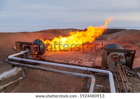 Similar – Image, Stock Photo Gas flaring at oil refinery in evening