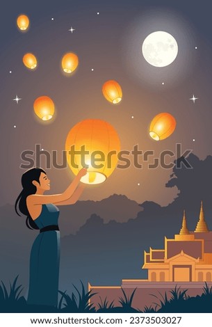 Girl releasing a lantern Thadingyut fullmoon