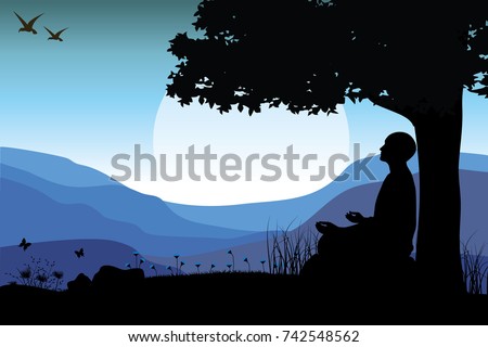 Man meditating in sitting yoga position on the top of a mountains above ...