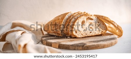 Similar – Image, Stock Photo Fresh bread on table in kitchen