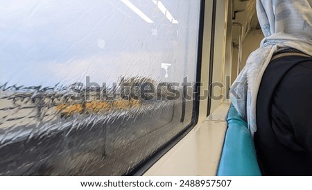 Similar – Foto Bild Regen im Zug eisenbahn