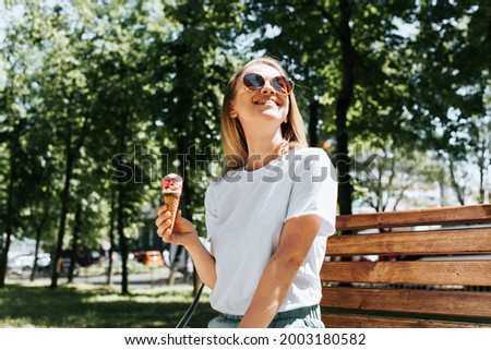 Similar – Image, Stock Photo young woman in cones of light from nocturnal street lighting lanterns