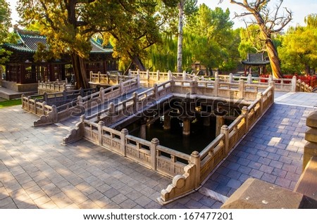 The Flying Bridge Across the Fish Pond of Jinci Memorial Temple(museum). They were built in about A.D.1000. Jinci is a famous old garden of China. It lies in the Taiyuan.