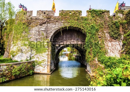Ancient city gate-Pan Gate. The Pan gate was one of Main gate in ancient Suzhou city. It is consists of water gate and land gate. The photo is water gate. Suzhou is one of the old watertowns in China.