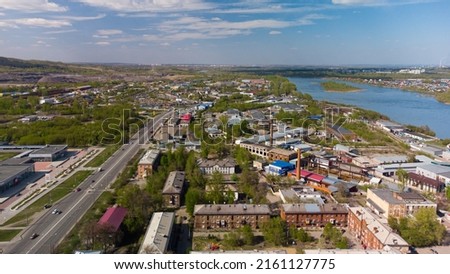 Doz Street in the city of Novokuznetsk from a height. Aerial photography, aerial view of the city of Novokuznetsk in spring and summer, central district, Kemerovo region, Russia Stock fotó © 