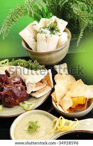 Game barbecue,  Cassava in garlic, butter, Yuca chips, soak and bake cassava bread and yuca with cheese dip
