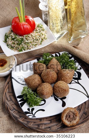 Middle eastern Fried Kibbe with Tabouli and Hummus Tahine