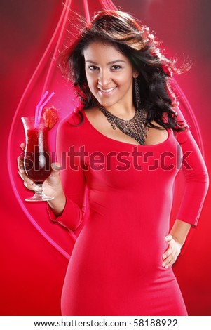 Cute brunette in red on red and strawberry daiquiri