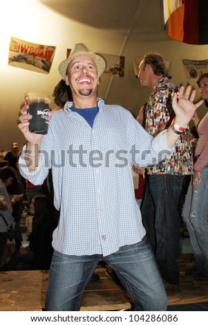 TULSA, OK - OCT 20: Party goers dance and drink beer at Oktoberfest in TULSA, OK, on October 20, 2011 in TULSA, OK. Tulsa is the origin of the first Oktoberfest Chicken Dance in the United States.