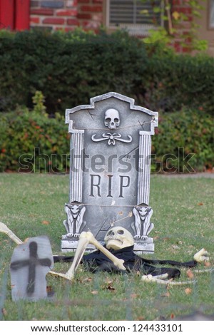 Skeletons and tomb stones decorations for Halloween celebration