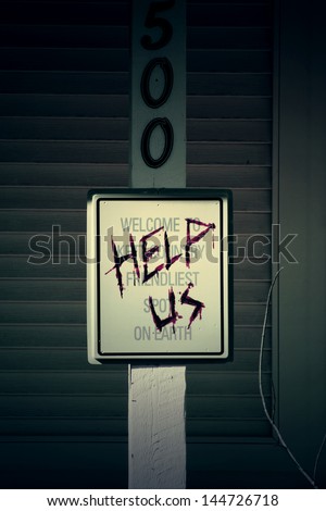 Scary sign written in blood that says \