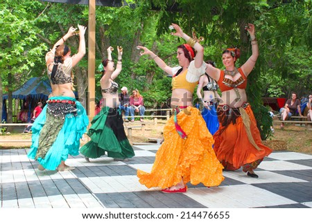 MUSKOGEE, OK - MAY 24: Dancer dressed as a Gypsy perform a belly dance at the Oklahoma 19th annual Renaissance Festival on May 24, 2014 at the Castle of Muskogee in Muskogee, OK.