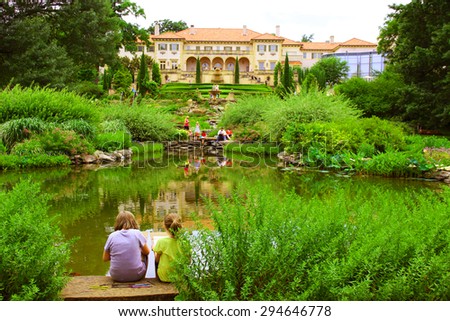 TULSA, OKLAHOMA - JUNE 13, 2015: People Enjoy A Day in a park at the Philbrook Museum of Art in Tulsa, Oklahoma. Museum draws a large crowd every second Saturday of the month, when admission is free.