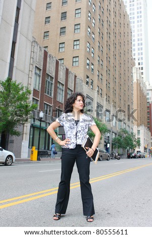 Powerful businesswoman on a street of a city