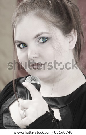 A young woman singer