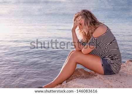 Portrait of a  girl  near the sea