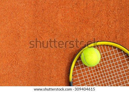 Sport background with a tennis racket and ball. \
Horizontal image.