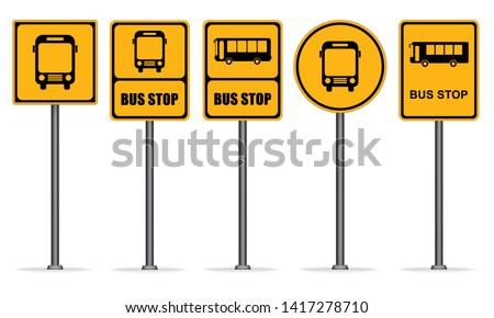 Set of yellow bus stop signs