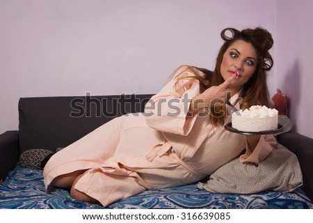 Overweight woman eating sweet cake with whipped cream. Film grain
