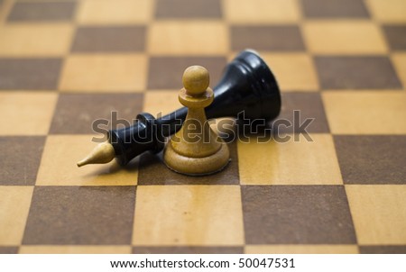 Queen chess pieces and a pawn on a white background