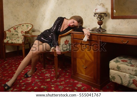 https://image.shutterstock.com/display_pic_with_logo/398806/555041767/stock-photo-strangled-beautiful-woman-in-a-short-black-dress-in-a-bedroom-simulation-of-the-crime-scene-555041767.jpg