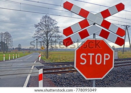 Similar – Image, Stock Photo Level crossing and stop sign in the snow at night