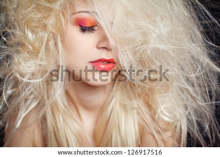Health and beauty products. Close-up portrait of sensual beautiful woman model face with fashion make-up blonde.
