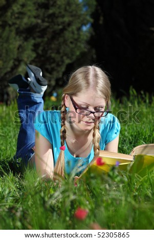 A student preparing for exams in nature