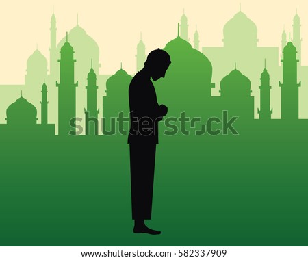 Moslem praying sholat illustration with black silhouette of a man doing pray and green silhouette of mosque with dome and towers as background