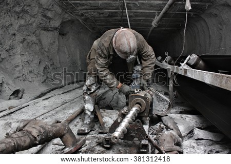 Similar – Image, Stock Photo Miner in the mine. Well-uniformed miner inside mine raising thumb