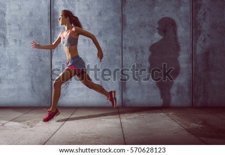Running woman with a fat shadow Foto stock © 