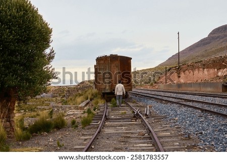 Similar – Foto Bild alter verlassener Wagon mit dem Wort Mafia aufgesprüht