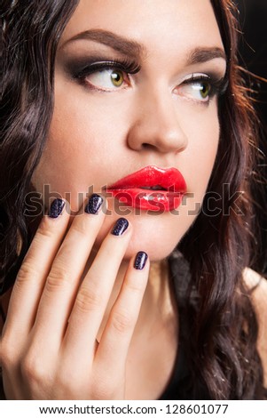 Fashion mode with curly hair make-up manicure portrait of young fashion Woman close-up