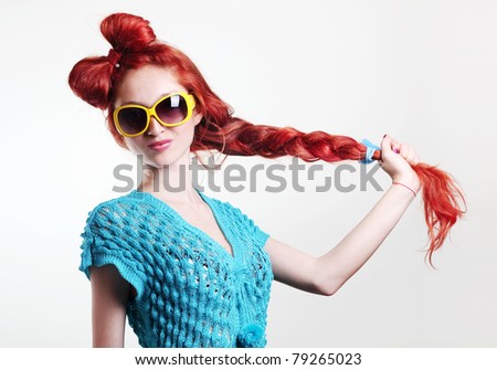 fashion woman with log hair in a stylish glasses