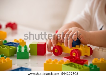 Similar – Image, Stock Photo Close up toddler hand on the table