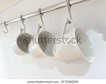 Similar – Image, Stock Photo Clean glasses hanging in bar