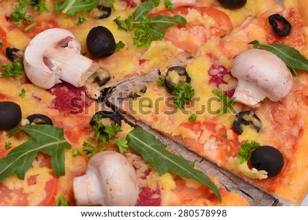 Very tasty mushrooms pizza tomatoes and olives
