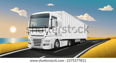 
White semi-trailer truck transports cargo on the road near the lake