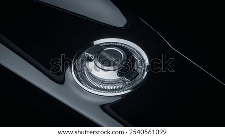 Similar – Image, Stock Photo Big black rear fender of an american road cruiser of the fifties in front of the window of an old house at the Golden Oldies in Wettenberg Krofdorf-Gleiberg near Giessen in Hesse, Germany.