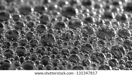 Black and white background shot with bubbles made from soap.
