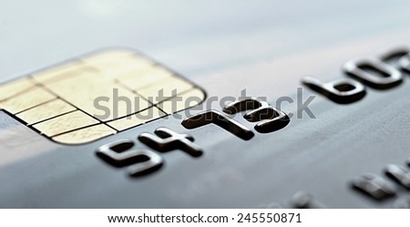 Chip of the gray credit card, closeup shot.