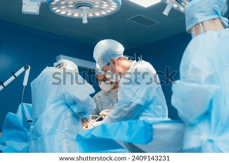 Image, Stock Photo Woman performing surgery in hospital