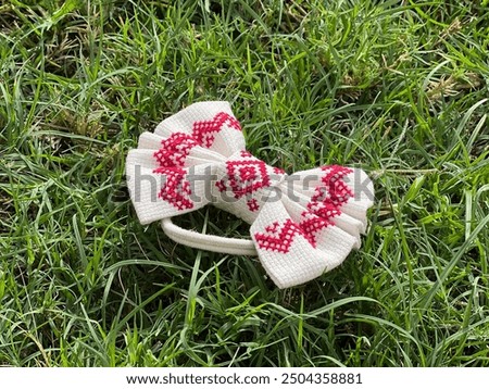 Similar – Image, Stock Photo Wool bands / wool rings for controlling oak processionary moths on an oak tree